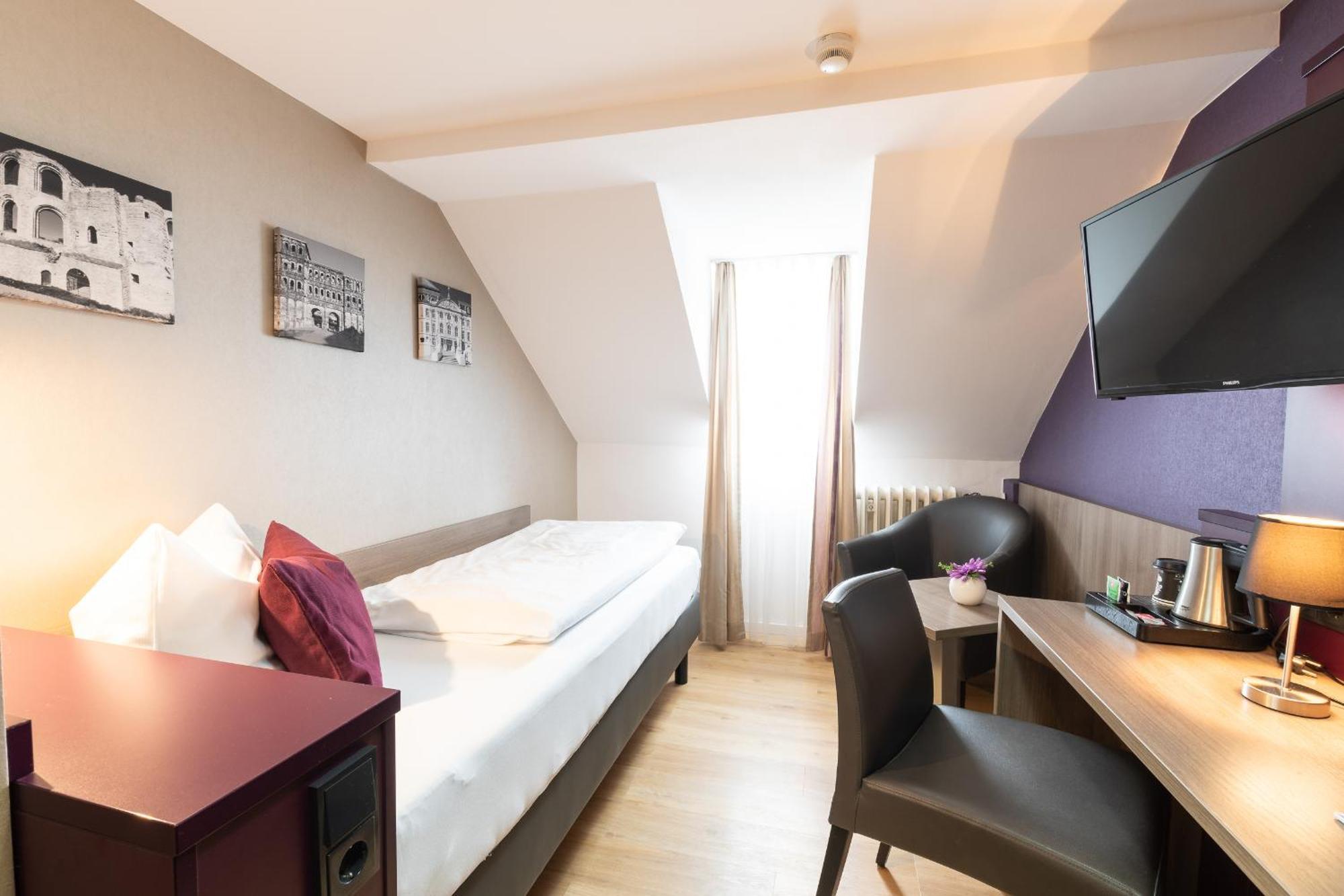 Hotel Porta Nigra Трир Стая снимка